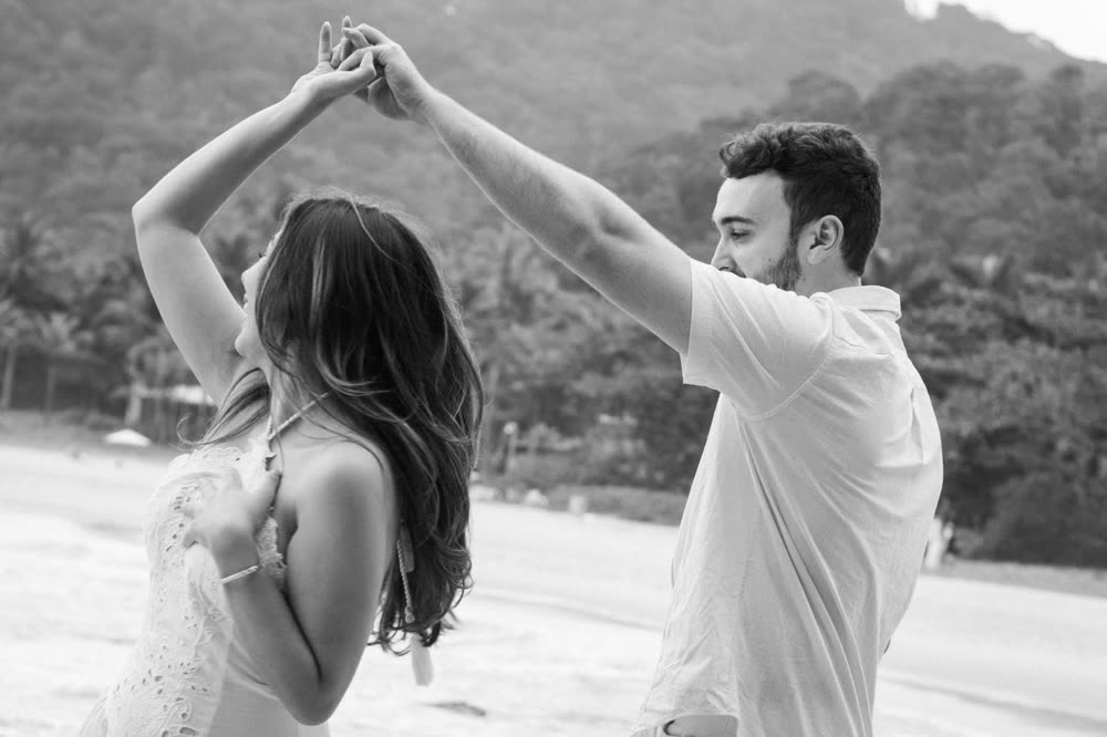 Beatriz and Brenden dancing on the beach